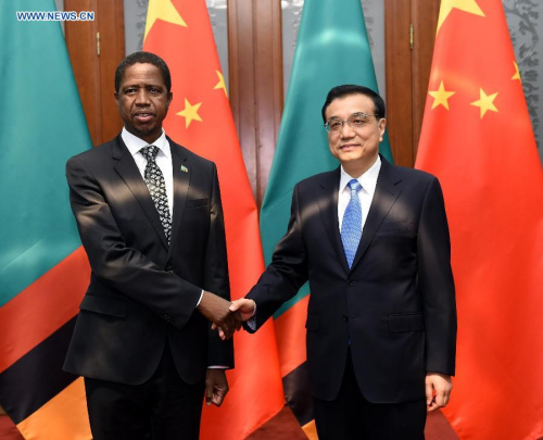 Chinese Premier Li Keqiang (R) meets with Zambian President Edgar Lungu in Beijing, capital of China, March 30, 2015. (Photo: Xinhua/Rao Aimin) Chinese Premier Li Keqiang (R) meets with Zambian President Edgar Lungu in Beijing, capital of China, March 30, 2015. (Photo: Xinhua/Rao Aimin)