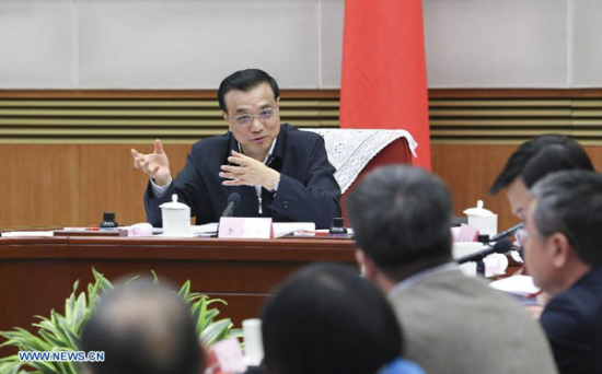 Chinese Premier Li Keqiang presides over a symposium on current economic situation in Beijing, capital of China, April 14, 2015. (Photo/Xinhua) Chinese Premier Li Keqiang presides over a symposium on current economic situation in Beijing, capital of China, April 14, 2015. (Photo/Xinhua)