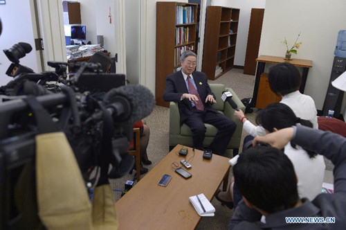 China's central bank governor Zhou Xiaochuan speaks during an interview in Washington D.C., capital of the United States, April 17, 2015. Members of the International Monetary Fund (IMF) are frustrated with the long-delayed 2010 quota reform of the fund and called for early passage of the reform, said Zhou here Friday. (Photo: Xinhua/Yin Bogu) China's central bank governor Zhou Xiaochuan speaks during an interview in Washington D.C., capital of the United States, April 17, 2015. Members of the International Monetary Fund (IMF) are frustrated with the long-delayed 2010 quota reform of the fund and called for early passage of the reform, said Zhou here Friday. (Photo: Xinhua/Yin Bogu)