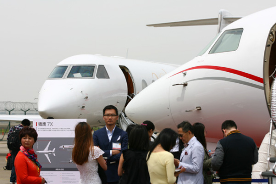 Dassault Falcon 7X business jets are on display at the 2015 Asian Business Aviation Conference and Exhibition in Shanghai. Chinese billionaires are the major buyers of luxury business jet aircraft in the world market. (Photo/China Daily) Dassault Falcon 7X business jets are on display at the 2015 Asian Business Aviation Conference and Exhibition in Shanghai. Chinese billionaires are the major buyers of luxury business jet aircraft in the world market. (Photo/China Daily)