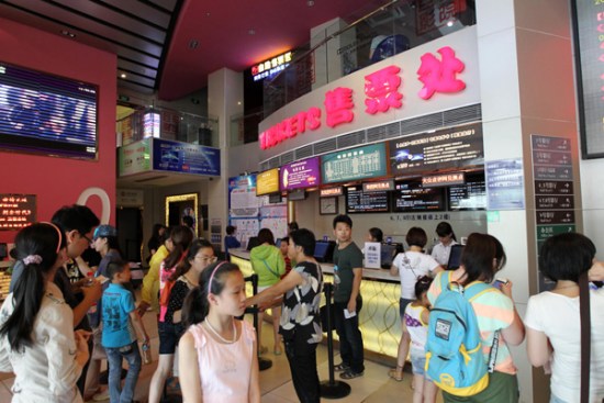 People buy tickets at a movie theater to watch Furious 7 in Nantong, Jiangsu province. (Photo/China Daily) People buy tickets at a movie theater to watch Furious 7 in Nantong, Jiangsu province. (Photo/China Daily)
