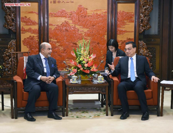 Chinese Premier Li Keqiang (R) meets with Chairman of the Malaysian Land Public Transportation Commission Syed Hamid bin Syed Jaafar Albar in Beijing, capital of China, May 4, 2015. (Xinhua/Rao Aimin) Chinese Premier Li Keqiang (R) meets with Chairman of the Malaysian Land Public Transportation Commission Syed Hamid bin Syed Jaafar Albar in Beijing, capital of China, May 4, 2015. (Xinhua/Rao Aimin)
