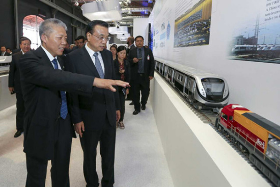 Chinese Premier Li Keqiang, center, pays a visit to the Chinese Equipment Manufacturing Industry Exposition in Rio de Janeiro in Brazil on May 20, 2015. (Photo/english.gov.cn) Chinese Premier Li Keqiang, center, pays a visit to the Chinese Equipment Manufacturing Industry Exposition in Rio de Janeiro in Brazil on May 20, 2015. (Photo/english.gov.cn)