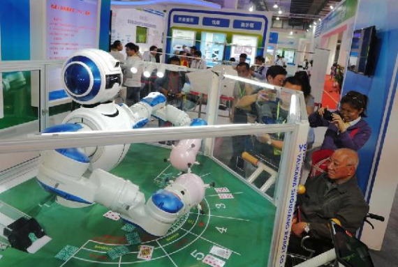 A robot on display during the 18th China Beijing International High-tech Expo in Beijing, May 13, 2015. (Photo/Xinhua) A robot on display during the 18th China Beijing International High-tech Expo in Beijing, May 13, 2015. (Photo/Xinhua)