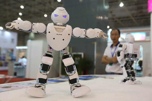 A robot on display at the China Processing Trade Products Fair, which opened in Dongguan, Guangdong province, on Wednesday. (Photo/China Daily) A robot on display at the China Processing Trade Products Fair, which opened in Dongguan, Guangdong province, on Wednesday. (Photo/China Daily)