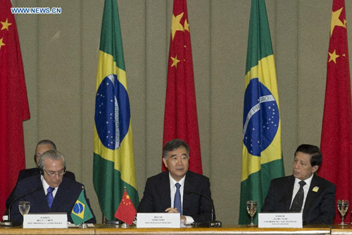 Chinese Vice Primier Wang Yang (C) and Brazilian Vice President Michel Temer (L) co-chair the fourth meeting of the China-Brazil High-Level Coordination and Cooperation Committee (COSBAN) in Brasilia, Brazil, June 26, 2015. (Xinhua/Rong Hao) Chinese Vice Primier Wang Yang (C) and Brazilian Vice President Michel Temer (L) co-chair the fourth meeting of the China-Brazil High-Level Coordination and Cooperation Committee (COSBAN) in Brasilia, Brazil, June 26, 2015. (Xinhua/Rong Hao)