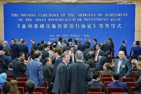 Representatives of prospective founders of the Asian Infrastructure Investment Bank (AIIB) prepare to attend the signing ceremony of the articles of agreement of AIIB in Beijing, capital of China, June 29, 2015. (Photo: Xinhua/Li Xin) Representatives of prospective founders of the Asian Infrastructure Investment Bank (AIIB) prepare to attend the signing ceremony of the articles of agreement of AIIB in Beijing, capital of China, June 29, 2015. (Photo: Xinhua/Li Xin)