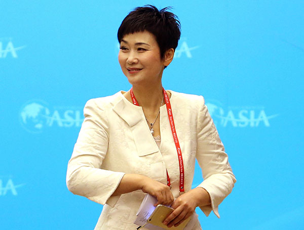 Li Xiaolin, newly-appointed vice-general manager of China Datang Corp, attends a seminar at the 2015 Bo'ao Forum for Asia in Hainan province in this March 29, 2015 file photo. (Photo by Wu Zhiyi/Asianewsphoto) Li Xiaolin, newly-appointed vice-general manager of China Datang Corp, attends a seminar at the 2015 Bo'ao Forum for Asia in Hainan province in this March 29, 2015 file photo. (Photo by Wu Zhiyi/Asianewsphoto)