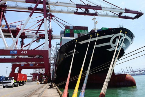 A container ship is being loaded at a dock in Qingdao, Shandong province, on Saturday. China's foreign trade was valued at about 2.07 trillion yuan ($333 billion) in June. (Photo/China Daily) A container ship is being loaded at a dock in Qingdao, Shandong province, on Saturday. China's foreign trade was valued at about 2.07 trillion yuan ($333 billion) in June. (Photo/China Daily)