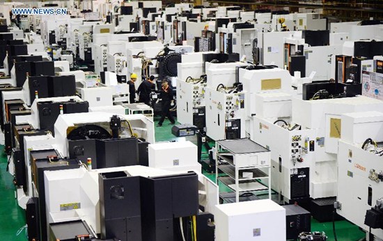 Workers install numerical controlled machine in LGMazak Company in northwest China's Ningxia Hui Autonomous Region, May 19, 2015. (Photo: Xinhua/Wang Peng) Workers install numerical controlled machine in LGMazak Company in northwest China's Ningxia Hui Autonomous Region, May 19, 2015. (Photo: Xinhua/Wang Peng)