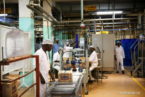 Workers work on a production line in Bidco's factory, on the outskirts of Nairobi, Kenya, on July 21, 2015. (Photo: Xinhua/Pan Siwei) Workers work on a production line in Bidco's factory, on the outskirts of Nairobi, Kenya, on July 21, 2015. (Photo: Xinhua/Pan Siwei)
