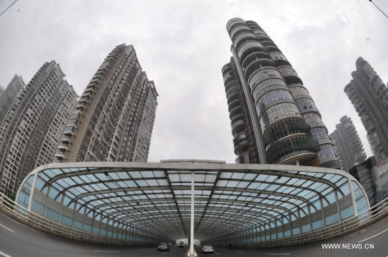 Photo taken on April 21, 2015 shows newly-built residential apartment buildings in the downtown of Changsha, capital of central China's Hunan Province. (Photo: Xinhua/Long Hongtao) Photo taken on April 21, 2015 shows newly-built residential apartment buildings in the downtown of Changsha, capital of central China's Hunan Province. (Photo: Xinhua/Long Hongtao)