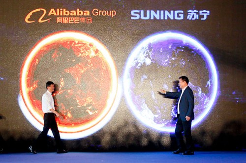 Alibaba buys 20% stake in Suning Chairman of Alibaba Jack Ma (left) and Zhang Jindong, founder of retailer Suning, at the press conference in Nanjing, capital of Jiangsu province, after the two companies reached a deal on Monday. (Photo/China Daily) Alibaba buys 20% stake in Suning Chairman of Alibaba Jack Ma (left) and Zhang Jindong, founder of retailer Suning, at the press conference in Nanjing, capital of Jiangsu province, after the two companies reached a deal on Monday. (Photo/China Daily)
