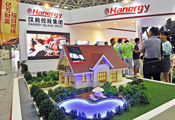 Hanergy Holding Group Ltd promotes its house-roof solar panels at a trade fair in Fuzhou, Fujian province. The company's unit Hanergy Thin Film Power said on Aug 16 that its profit from related-party transactions is expected to decline to HK$200 million for the first half of the year, a drop of more than 90 percent from a year ago. (Photo provided to China Daily) Hanergy Holding Group Ltd promotes its house-roof solar panels at a trade fair in Fuzhou, Fujian province. The company's unit Hanergy Thin Film Power said on Aug 16 that its profit from related-party transactions is expected to decline to HK$200 million for the first half of the year, a drop of more than 90 percent from a year ago. (Photo provided to China Daily)