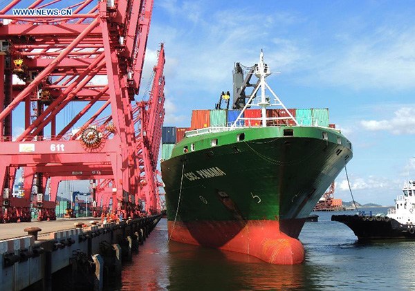 Containers are unloaded from a cargo ship in Lianyungang, East China's Jiangsu province, Sept 8, 2015. In the first eight months of 2015, foreign trade slipped 7.7 percent year on year to 15.67 trillion yuan, the General Administration of Customs (GAC) figures showed. Exports dipped 1.6 percent to 8.95 trillion yuan in the Jan-Aug period, while imports fell 14.6 percent to 6.72 trillion yuan. In the first eight months, trade surplus jumped 80.8 percent to 2.23 trillion yuan, according to the GAC. (Photo/Xinhua) Containers are unloaded from a cargo ship in Lianyungang, East China's Jiangsu province, Sept 8, 2015. In the first eight months of 2015, foreign trade slipped 7.7 percent year on year to 15.67 trillion yuan, the General Administration of Customs (GAC) figures showed. Exports dipped 1.6 percent to 8.95 trillion yuan in the Jan-Aug period, while imports fell 14.6 percent to 6.72 trillion yuan. In the first eight months, trade surplus jumped 80.8 percent to 2.23 trillion yuan, according to the GAC. (Photo/Xinhua)