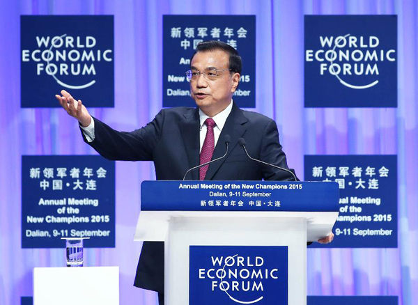 Chinese Premier Li Keqiang addresses the opening ceremony of the annual meeting of the New Champions, also known as the Summer Davos Forum, in Dalian, northeast China's Liaoning Province, Sept. 10, 2015. (Xinhua/Yao Dawei) Chinese Premier Li Keqiang addresses the opening ceremony of the annual meeting of the New Champions, also known as the Summer Davos Forum, in Dalian, northeast China's Liaoning Province, Sept. 10, 2015. (Xinhua/Yao Dawei)