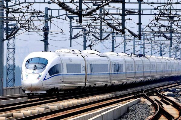 A CRH train that runs on the Beijing-Shanghai High-Speed Railway leaves Tianjin South Railway Station in North China's Tianjin, June 30, 2012. (Photo/Xinhua) A CRH train that runs on the Beijing-Shanghai High-Speed Railway leaves Tianjin South Railway Station in North China's Tianjin, June 30, 2012. (Photo/Xinhua)