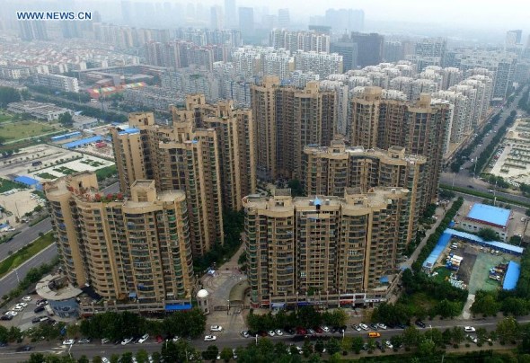 Photo taken on Aug. 17, 2015 shows residential buildings in Zhengzhou, capital of central China's Henan Province. (Photo: Xinhua/Li Bo) Photo taken on Aug. 17, 2015 shows residential buildings in Zhengzhou, capital of central China's Henan Province. (Photo: Xinhua/Li Bo)