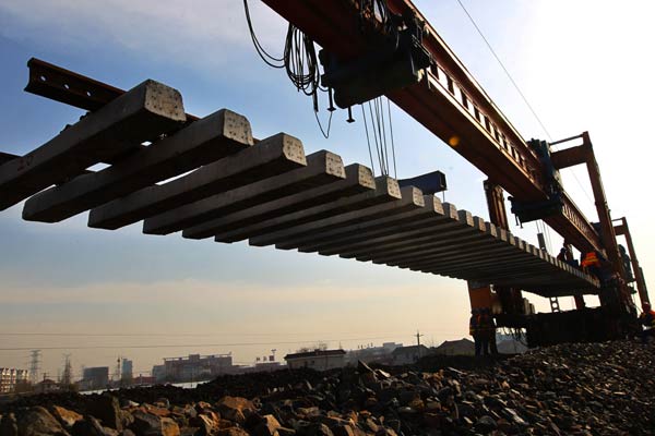 Rail tracks are laid on a route in Nantong, Jiangsu province. (Photo provided to China Daily)