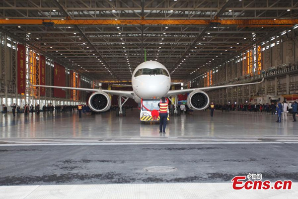 China's first large passenger jet C919 rolls off the production line in Shanghai municipality on November 2, 2015. The maiden test flight of the C919 is scheduled for 2016. So far, 450 orders from 18 domestic and foreign clients have been placed for the jetliner. (Photo: China News Service/ Zhang Hengwei) China's first large passenger jet C919 rolls off the production line in Shanghai municipality on November 2, 2015. The maiden test flight of the C919 is scheduled for 2016. So far, 450 orders from 18 domestic and foreign clients have been placed for the jetliner. (Photo: China News Service/ Zhang Hengwei)