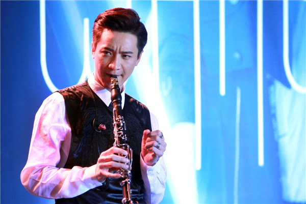 Clarinetist Wang Tao experiments with music of classical, pop, jazz and rock in his latest album, Night & Day. (Photo: China Daily/Zou Hong) Clarinetist Wang Tao experiments with music of classical, pop, jazz and rock in his latest album, Night & Day. (Photo: China Daily/Zou Hong)