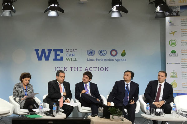 BYD's founder and chairman Wang Chuanfu (2nd from right) said it has been absolutely imperative that the global leaders reached an agreement at UN climate talks in Paris. (Photo for China Daily)