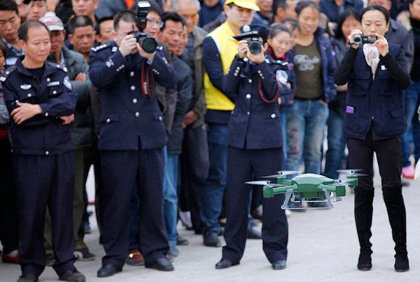 A drone to help crack down on illegal drugs in Huidong, Guangdong province, is demonstrated in 2014. (Photo: China Daily/Chen Weibin) A drone to help crack down on illegal drugs in Huidong, Guangdong province, is demonstrated in 2014. (Photo: China Daily/Chen Weibin)