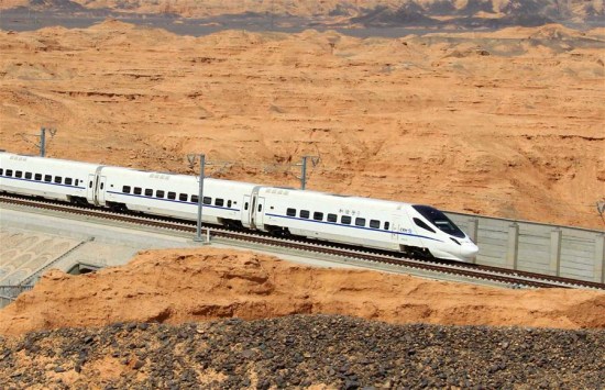 Photo taken April 23, 2015 shows a high-speed train moving past a Yadan landform in northwest China's Xinjiang Uygur Autonomous Region. (Photo: Xinhua/Cai Zengle) Photo taken April 23, 2015 shows a high-speed train moving past a Yadan landform in northwest China's Xinjiang Uygur Autonomous Region. (Photo: Xinhua/Cai Zengle)