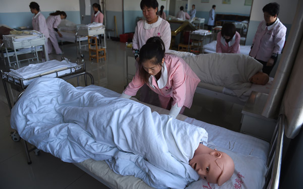 Rurual workers receive training as homecare service workers at a company in Ulanqab, the Inner Mongolia autonomous region. With support from the local government, more than 3,000 rural workers have been trained free of charge. (Photo/Xinhua) Rurual workers receive training as homecare service workers at a company in Ulanqab, the Inner Mongolia autonomous region. With support from the local government, more than 3,000 rural workers have been trained free of charge. (Photo/Xinhua)