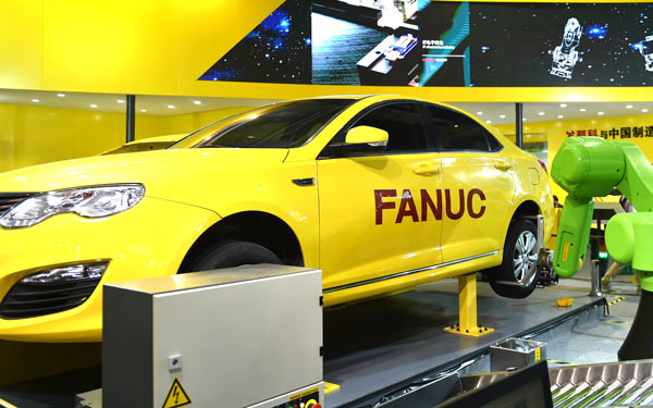 Japanese robot maker Fanuc Corp's product at a fair in Shanghai.(Photo/China Daily) Japanese robot maker Fanuc Corp's product at a fair in Shanghai.(Photo/China Daily)
