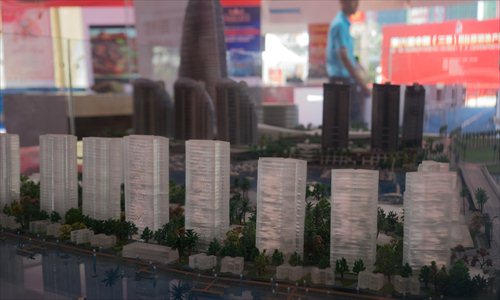 A model residential development aims to catch the eyes of homebuyers last week at a real estate exhibition in Sanya, South China's Hainan Province. (Photo: Chen Qingqing/GT) A model residential development aims to catch the eyes of homebuyers last week at a real estate exhibition in Sanya, South China's Hainan Province. (Photo: Chen Qingqing/GT)