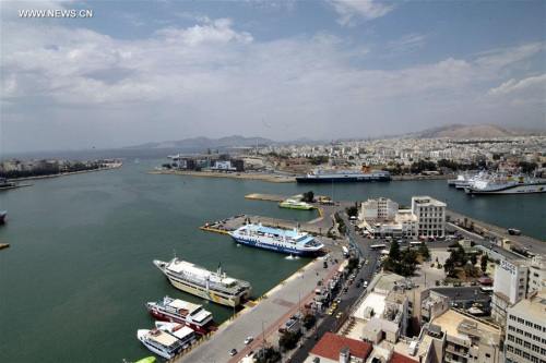 Ships are docked at Piraeus port in Athens, Greece on Feb. 17, 2016. The Greek privatization fund announced on Wednesday that China's COSCO was formally declared the preferred investor for the privatization of Greece's largest port, Piraeus. (Photo: Xinhua/Marios Lolos) Ships are docked at Piraeus port in Athens, Greece on Feb. 17, 2016. The Greek privatization fund announced on Wednesday that China's COSCO was formally declared the preferred investor for the privatization of Greece's largest port, Piraeus. (Photo: Xinhua/Marios Lolos)