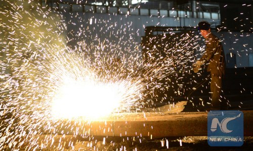 A factory worker is making steel. (Xinhua file photo) A factory worker is making steel. (Xinhua file photo)