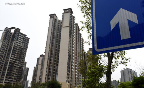Photo taken on March 12, 2016 shows residential building on sell in Guangzhou, capital of south China's Guangdong Province. (Photo: Xinhua/Lu Hanxin) Photo taken on March 12, 2016 shows residential building on sell in Guangzhou, capital of south China's Guangdong Province. (Photo: Xinhua/Lu Hanxin)