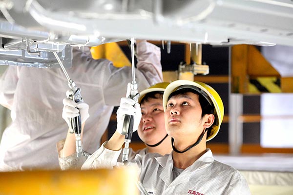 Workers at the production line of Anhui Jianghuai Automobile Co Ltd in Hefei, capital of Anhui province. (Photo provided to chinadaily.com.cn) Workers at the production line of Anhui Jianghuai Automobile Co Ltd in Hefei, capital of Anhui province. (Photo provided to chinadaily.com.cn)