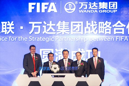 Wanda announced a sponsorship agreement with FIFA at a conference held in Beijing on Monday. (Photo/Courtesy of Wanda) Wanda announced a sponsorship agreement with FIFA at a conference held in Beijing on Monday. (Photo/Courtesy of Wanda)
