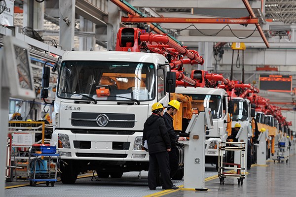 Sany Group technicians assemble engineering machinery in the firm's assembly plant in Changsha, Hunan province. (Photo/Xinhua) Sany Group technicians assemble engineering machinery in the firm's assembly plant in Changsha, Hunan province. (Photo/Xinhua)