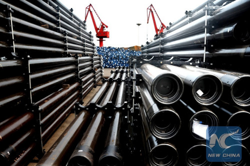 Photo taken on Aug. 1, 2015 shows steel tubes at a dock in Lianyungang Port, east China's Jiangsu Province. (Photo: Xinhua/Wang Chun) Photo taken on Aug. 1, 2015 shows steel tubes at a dock in Lianyungang Port, east China's Jiangsu Province. (Photo: Xinhua/Wang Chun)