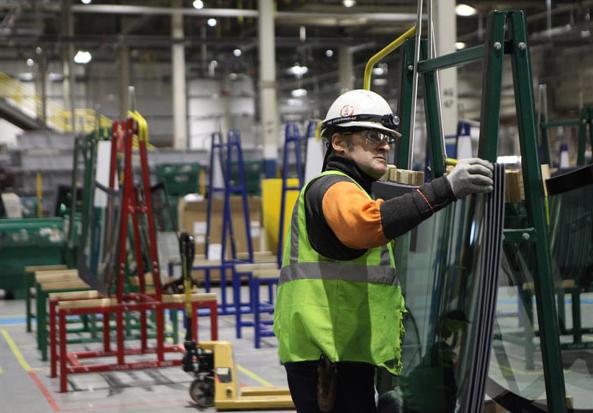 A worker inspects parts at Fuyao Glass America, the US branch of China's largest automotive glass maker. The company is working toward achieving full production capacity at its facility in Moraine, Ohio. HEZI JIANG / CHINA DAILY A worker inspects parts at Fuyao Glass America, the US branch of China's largest automotive glass maker. The company is working toward achieving full production capacity at its facility in Moraine, Ohio. HEZI JIANG / CHINA DAILY