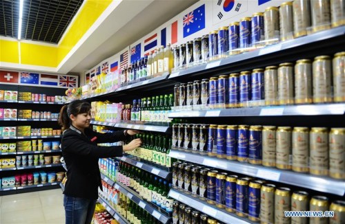 A shop assistant settles articles at a purchase center of imported goods in Shijiazhuang, capital of north China's Hebei Province, April 8, 2016. (Xinhua/Wang Xiao) A shop assistant settles articles at a purchase center of imported goods in Shijiazhuang, capital of north China's Hebei Province, April 8, 2016. (Xinhua/Wang Xiao)