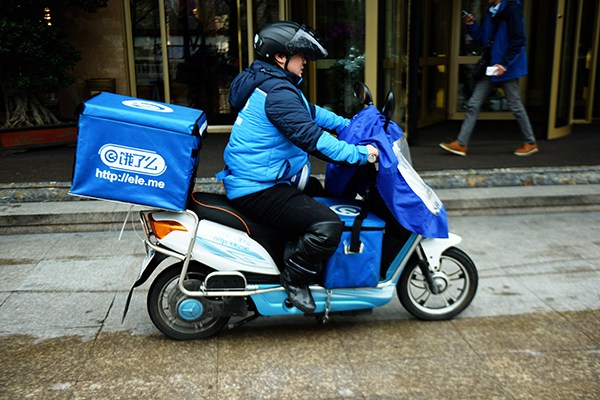 A delivery man for Ele.me in Hangzhou, capital of Zhejiang province. (Photo/China Daily) A delivery man for Ele.me in Hangzhou, capital of Zhejiang province. (Photo/China Daily)