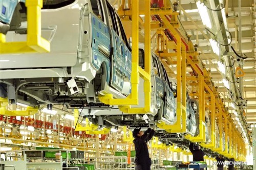 Laborers work at a car factory March 22, 2016 in Huanghua City, north China's Hebei Province. China's GDP stood at 15.9 trillion RMB yuan (2.4 trillion U.S. dollars) in the first quarter this year, growing up by 6.7 percent year on year, the National Bureau of Statistics said on April 15, 2016. (Xinhua/Mou Yu) Laborers work at a car factory March 22, 2016 in Huanghua City, north China's Hebei Province. China's GDP stood at 15.9 trillion RMB yuan (2.4 trillion U.S. dollars) in the first quarter this year, growing up by 6.7 percent year on year, the National Bureau of Statistics said on April 15, 2016. (Xinhua/Mou Yu)