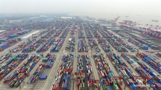 This aerial photo taken on March 29, 2016 shows a view of the free trade zone in Shanghai, east China. China's GDP stood at 15.9 trillion RMB yuan (2.4 trillion U.S. dollars) in the first quarter this year, growing up by 6.7 percent year on year, the National Bureau of Statistics said on April 15, 2016. (Xinhua/Ding Ting) This aerial photo taken on March 29, 2016 shows a view of the free trade zone in Shanghai, east China. China's GDP stood at 15.9 trillion RMB yuan (2.4 trillion U.S. dollars) in the first quarter this year, growing up by 6.7 percent year on year, the National Bureau of Statistics said on April 15, 2016. (Xinhua/Ding Ting)