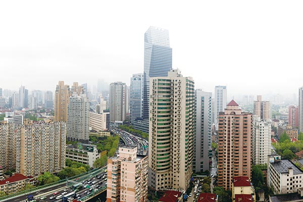 Because of purchasing limits in first-tier cities, property trades have risen rapidly in the neighboring cities of Wuxi, Jiangsu province, as well as Dongguan and Foshan in Guangdong province.(File photo) Because of purchasing limits in first-tier cities, property trades have risen rapidly in the neighboring cities of Wuxi, Jiangsu province, as well as Dongguan and Foshan in Guangdong province.(File photo)