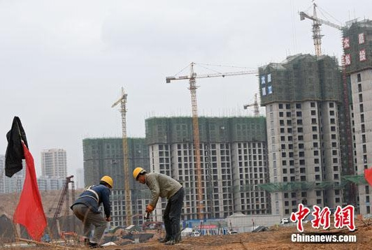 A real estate project under construction in China. (File photo) A real estate project under construction in China. (File photo)
