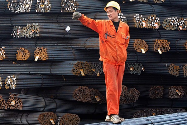 A worker at a steel depot in Qingdao Port, Shandong province.(Photo provided to China Daily) A worker at a steel depot in Qingdao Port, Shandong province.(Photo provided to China Daily)