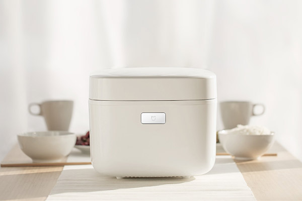 A Mijia rice cooker, made by an ecosystem company of Chinese tech company Xiaomi, is pictured in a kitchen. The smartphone-controlled induction heating pressure rice cooker is priced above most Chinese-made ones, at 999 yuan. (Photo provided to chinadaily.com.cn) A Mijia rice cooker, made by an ecosystem company of Chinese tech company Xiaomi, is pictured in a kitchen. The smartphone-controlled induction heating pressure rice cooker is priced above most Chinese-made ones, at 999 yuan. (Photo provided to chinadaily.com.cn)