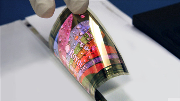 A rollable full-color flexible display with thickness of less than one-fifth the diameter of the human hair.(CHINA DAILY) A rollable full-color flexible display with thickness of less than one-fifth the diameter of the human hair.(CHINA DAILY)