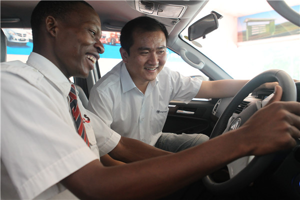 A local potential buyer test-drives a Beijing Automotive Industry Holding Co's truck model under the guidance of Guo Lei, general manager of Foton East Africa Ltd, a subsidiary of BAIC, in Nairobi, Kenya.(CHINA DAILY) A local potential buyer test-drives a Beijing Automotive Industry Holding Co's truck model under the guidance of Guo Lei, general manager of Foton East Africa Ltd, a subsidiary of BAIC, in Nairobi, Kenya.(CHINA DAILY)