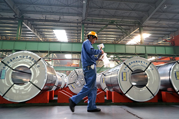 A worker checks steel product files at a cold rolling mill of Tangsteel Group Ltd in Tangshan, Hebei province.(Photo/China Daily) A worker checks steel product files at a cold rolling mill of Tangsteel Group Ltd in Tangshan, Hebei province.(Photo/China Daily)